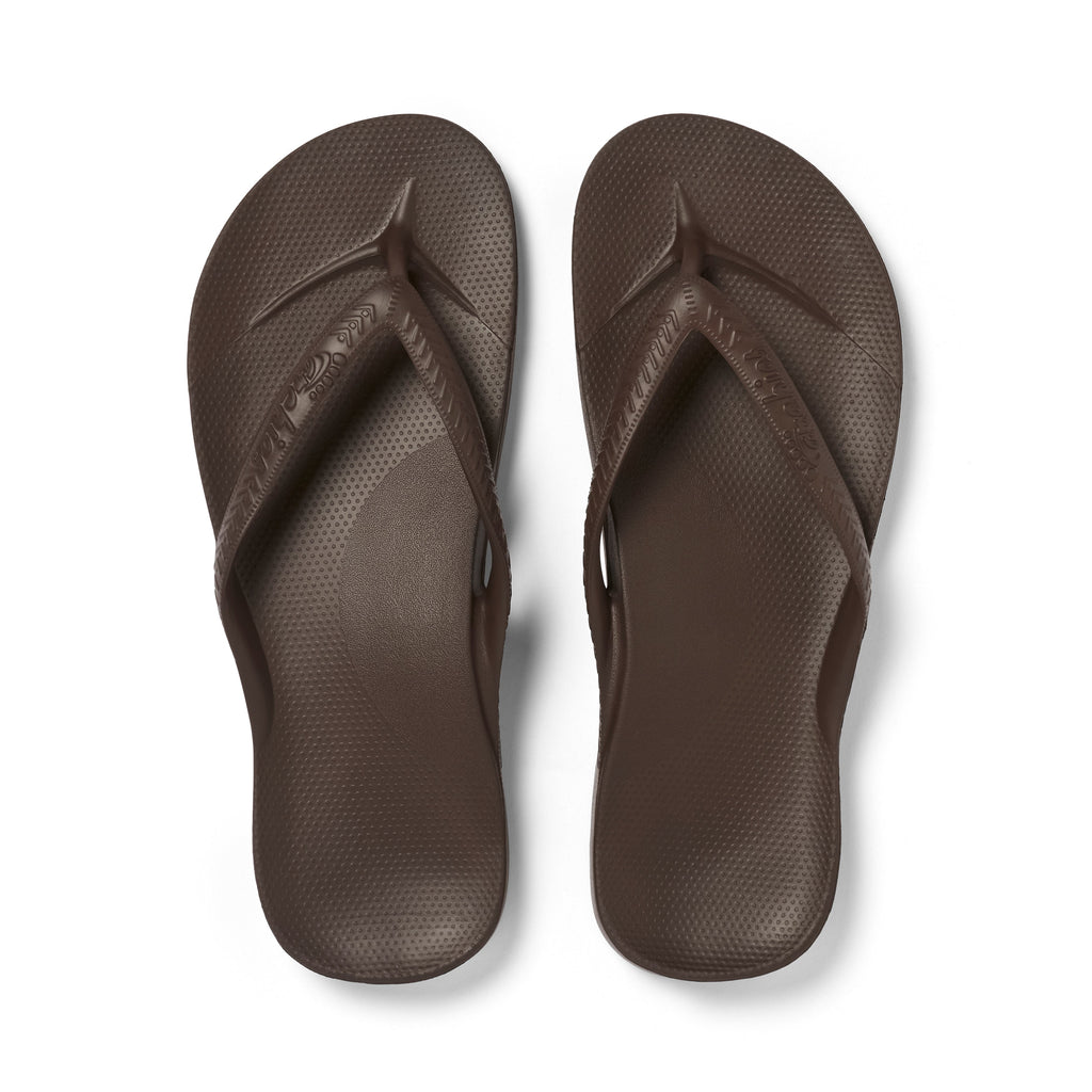 Archies Footwear brown flip-flops top view on a white background